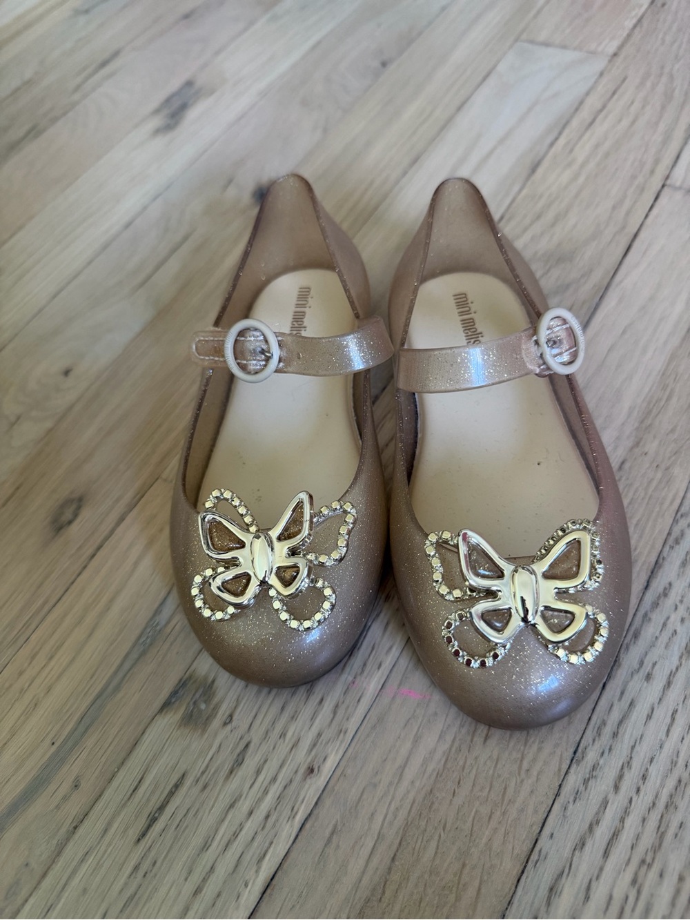 Mini Melissa gold Maryjane butterfly detail size 10